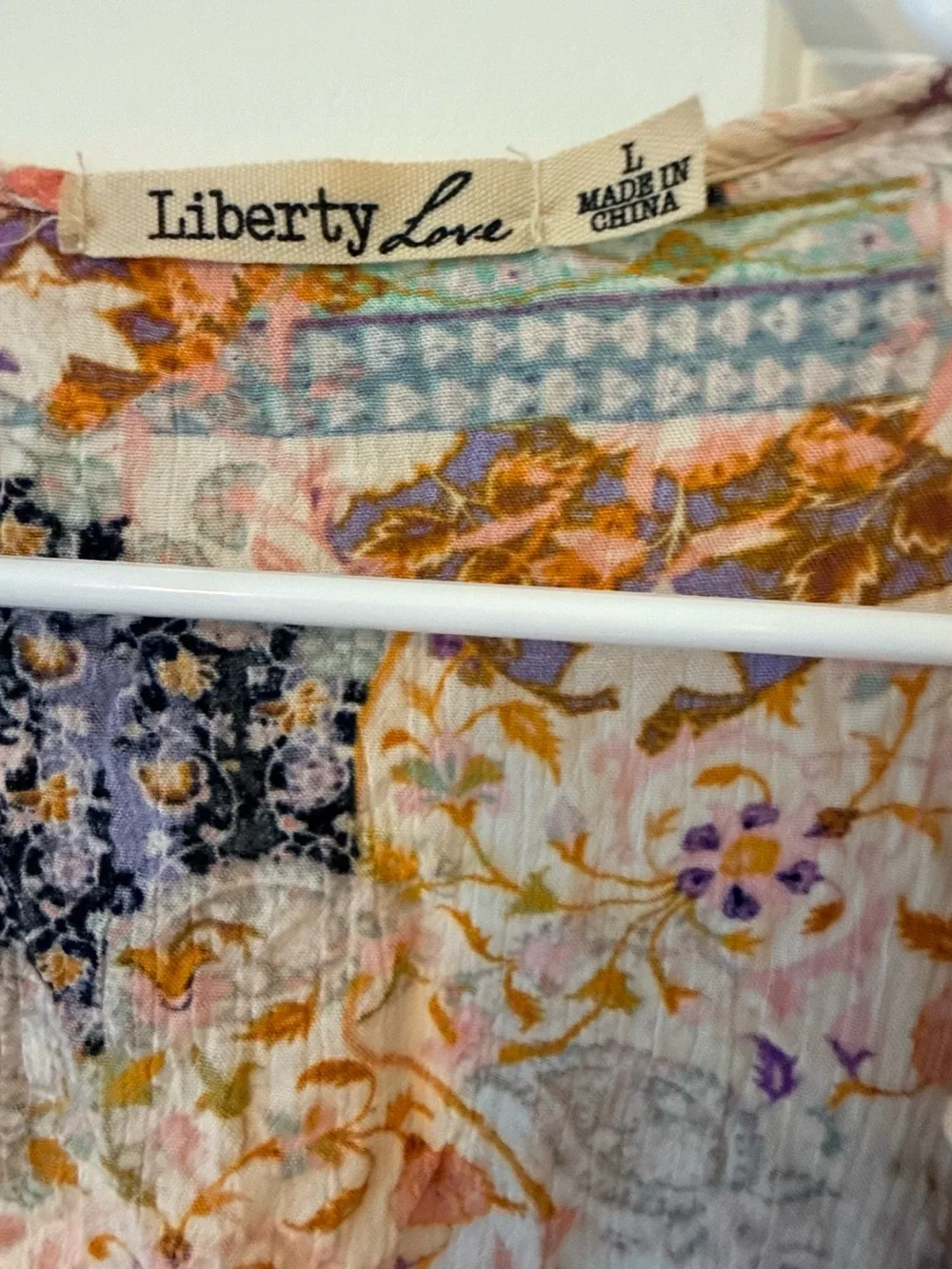 Liberty Love floral paisley top in purple, pink, gold and cream